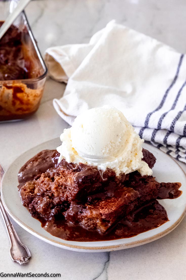 old-fashioned chocolate cobbler topped with a scoop of vanilla ice cream