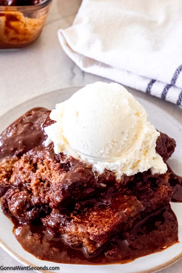 best chocolate cobbler topped with a scoop of vanilla ice cream