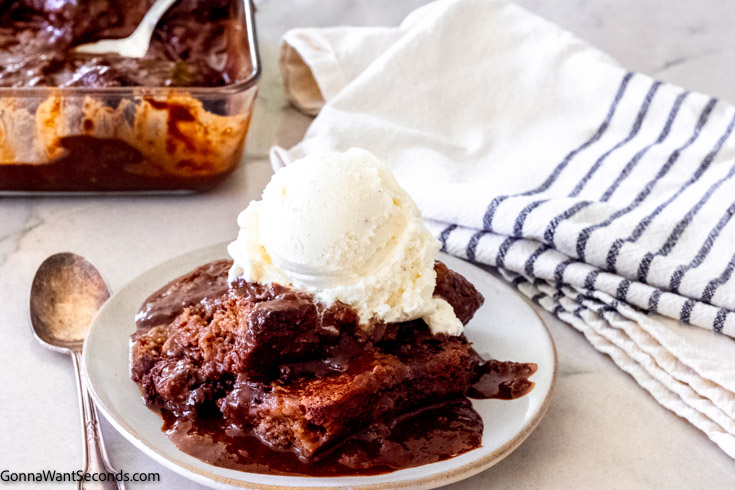 southern chocolate cobbler topped with a scoop of vanilla ice cream