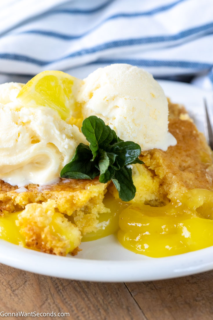 lemon dump cake topped with vanilla ice cream