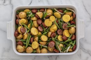 how to make smoked sausage green beans and potatoes , transfer to the baking dish