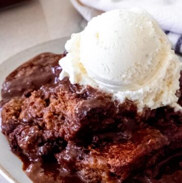 chocolate cobbler topped with a scoop of vanilla ice cream