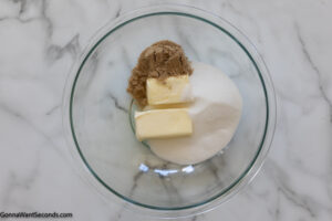 Step 4 how to make strawberry cheesecake cookies, In a large mixing bowl, cream together the butter and the sugars.