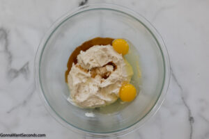 Step 5 how to make strawberry cheesecake cookies, Add the vanilla and eggs. Cream until well combined.
