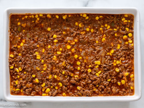 how to make bisquick quick taco bake step 4, Transfer the beef mixture in the prepared baking pan.
