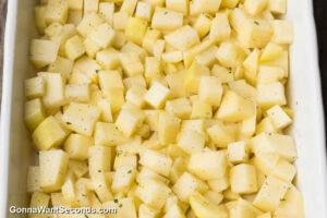 how to make ranch potatoes step 1, place potatoes & ranch dressing to the baking dish