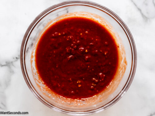 how to make simple taco lasagna recipe , stir together salsa and tomato sauce