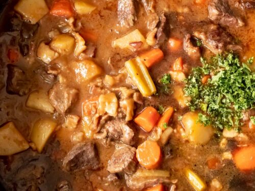 How to make irish beef and guinness stew, Lower the heat and partially cover, simmer for 2 hours. Continue to simmer until the beef is tender. Add the remaining beer and parsley.
