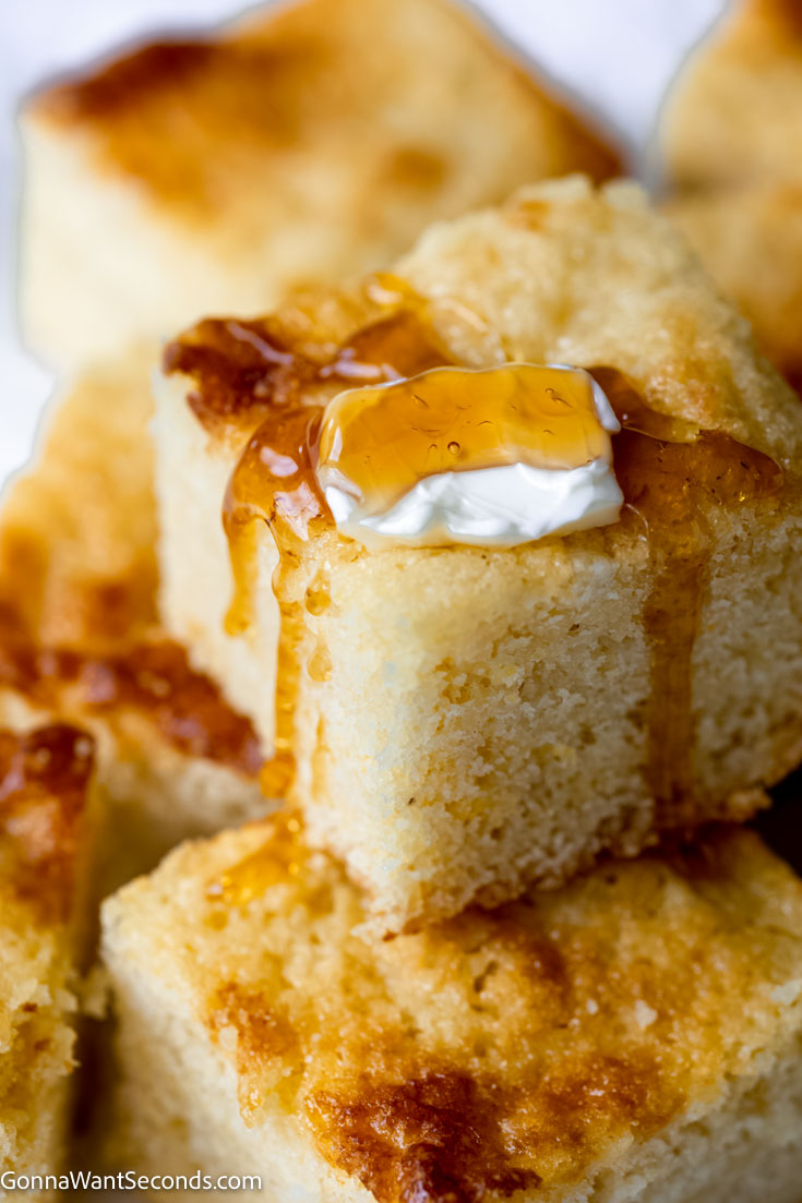 bisquick cornbread casserole drizzled with honey