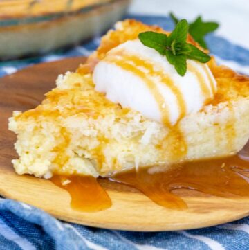 a slice of impossible coconut pie topped with vanilla ice cream