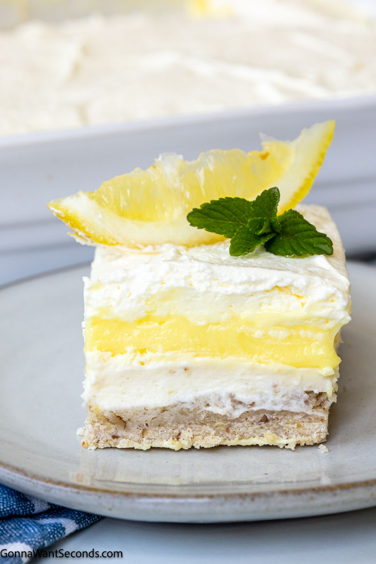 A slice lemon lush dessert