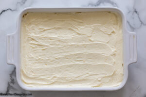 How to make lemon lush with shortbread crust step 5, Spread mixture over crust. Freeze until set.