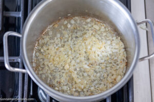 how to make Bisquick chicken and dumplings step 1, sauteing onion