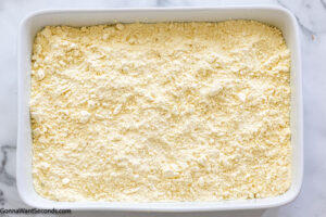 how to make dump cake cherry step 2, spread yellow cake mix