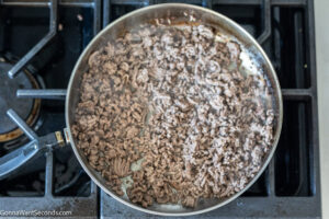 Step 1 How to make mexican casserole, Cook and crumble ground beef on a skillet.