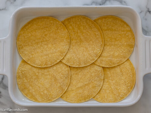 Step 4 how to make easy mexican casserole with ground beef, Arrange 6 tortillas in the bottom of the dish