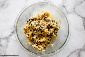 Step 4 how to make cake mix cookie bars, fold in the chocolate chips