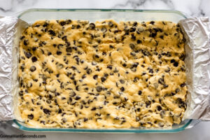 Step 5 how to make cake mix bars, spread dough evenly in prepared baking dish and bake