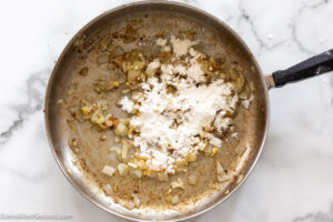 Step 3 How to make tuscan sausage pasta, sprinkle flour