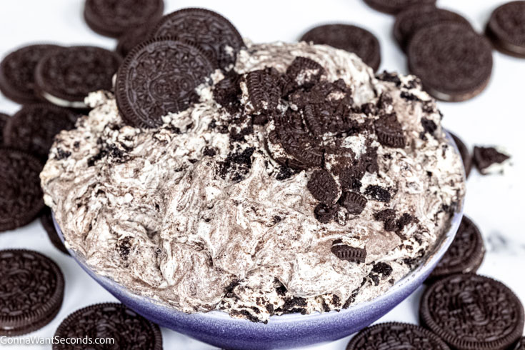 oreo fluff dip topped with crushed oreos in a bowl