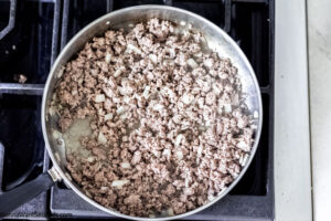 Step 1 how to make spaghetti tacos, cook the ground beef