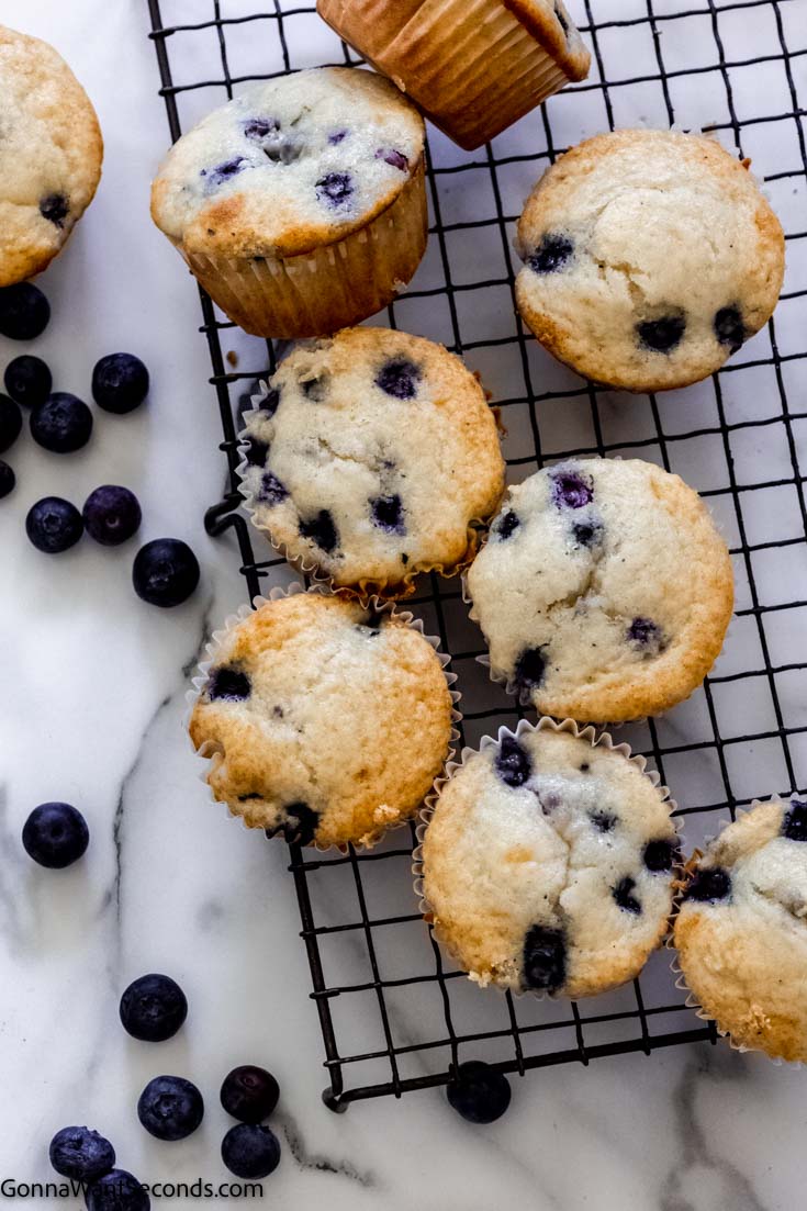 Bisquick fresh blueberry muffins on a cooling rack