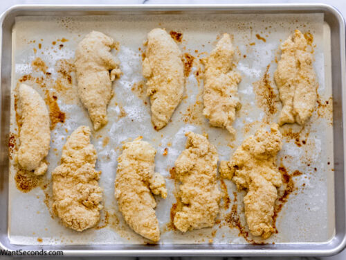 Step 5 how to make Bisquick chicken fingers, drizzle melted butter over chicken strips