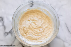Step 2 how to make butter swim biscuits, add buttermilk