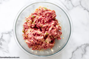 Step 3 how to make copycat cracker barrel meatloaf, add the ground beef and mix