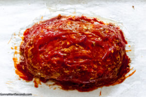 Step 6 how to make cracker barrel meatloaf copycat, brush the topping and bake again