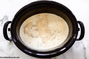 Step 4 how to make buffalo wild wings chicken pasta crockpot, sprinkle parmesan