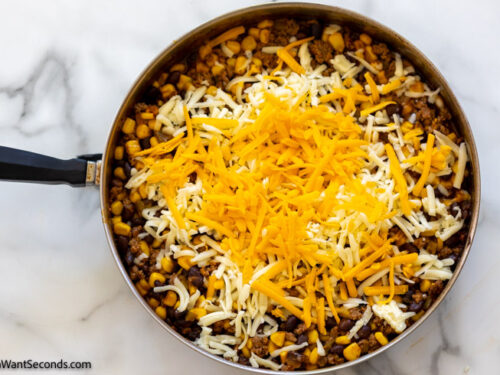Step 5 how to make Mexican tater tot casserole, add the cheese