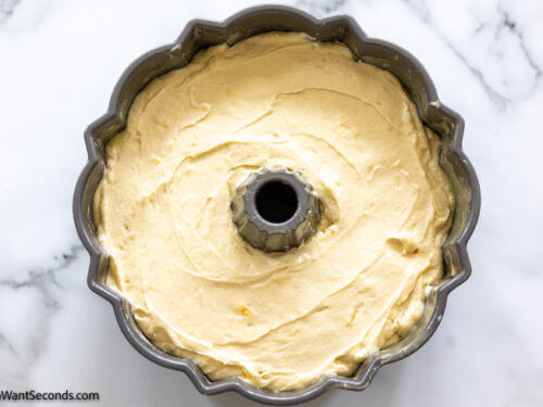 Step 7 how to make best pineapple pound cake, Pour batter into the bundt pan. Bake.