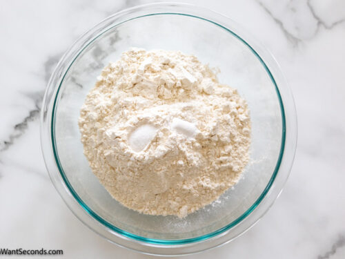 Step 1 how to makepineapple pound cake, Mix flour, baking powder, and salt.
