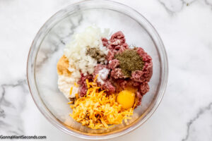 Step 3 how to make air fryer meatloaf, Add the rest of the ingredients.