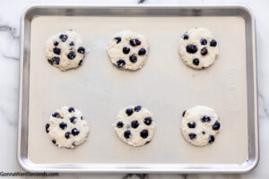 Step 6 how to make Bojangles boberry biscuit, cut out the dough into circles, bake