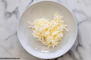Step 1 how to make Bo Berry biscuit, shred the butter