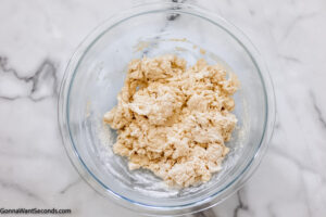 Step 3 how to make Bojangles boberry biscuit, add the butter and mix