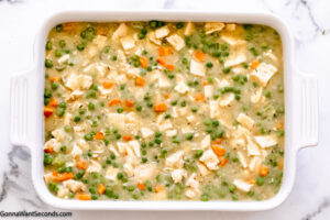 Step 7 how to make oven baked chicken and dumplings, Pour into the prepared baking dish.