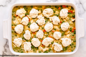 Step 10 how to make chicken casserole with dumplings, Drop by spoonfuls over the chicken mixture.