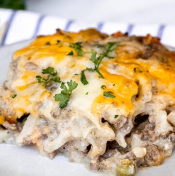 a slice of hamburger hashbrown casserole on a plate