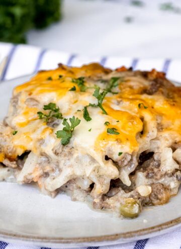 a slice of hamburger hashbrown casserole on a plate