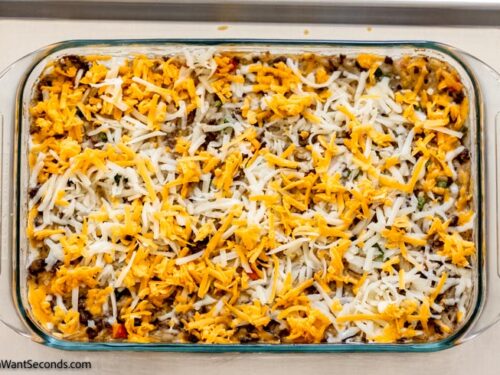 Step 6 how to make hamburger hashbrown casserole with frozen hashbrown, Remove from the oven and add the remaining cheese. Bake again until the cheese melts.