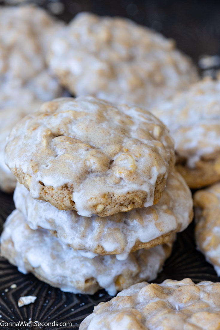 oatmeal cookies with icing stack on top of each other