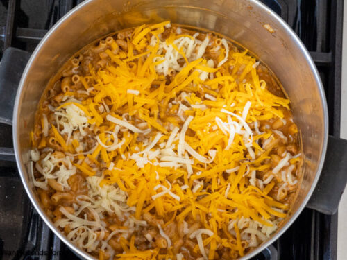 Step 7 how to make taco mac and cheese, add the remaining cheese