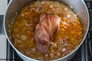 Step 4 how to make old fashioned collard greens recipe, add liquids, seasonings