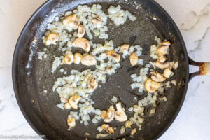 Step 6 how to make old fashioned green bean casserole, Saute until onions are translucent.