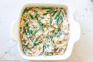 Step 10 how to make Paula Deen Green Bean Casserole, Pour into prepared baking dish. Bake.