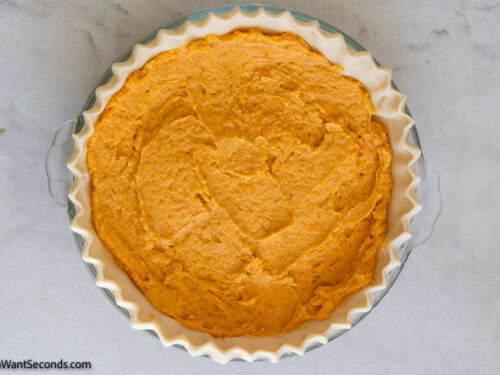 Step 7 how to make classic sweet potato pie, pour the sweet potato mixture into the pie shell