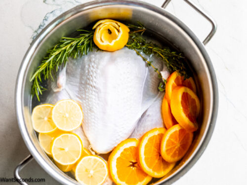 Step 3 how to make turkey brine with oranges, place the turkey in a pot. Add water and the rest of the ingredients. Place in the fridge.